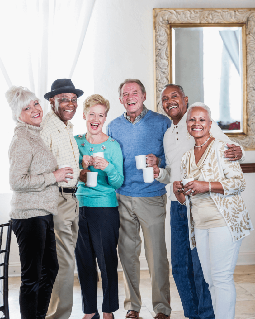 Assisted Living & Nursing Home residents enjoying quality time together with a cup of coffee,